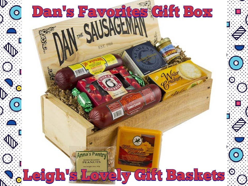 Dan's The Sausage Man's classic pine gift 
 box Includes Summer Sausage,
Sharp Cheese,
Pepper Jelly,
Smoked Salmon,
Smoked Pate,
Spiced Almonds,
Sweet N Hot Mustard,
Crackers,
Chocolate Truffles,
Chocolate Covered Cherries, Blueberries, Cranberries and Apricots