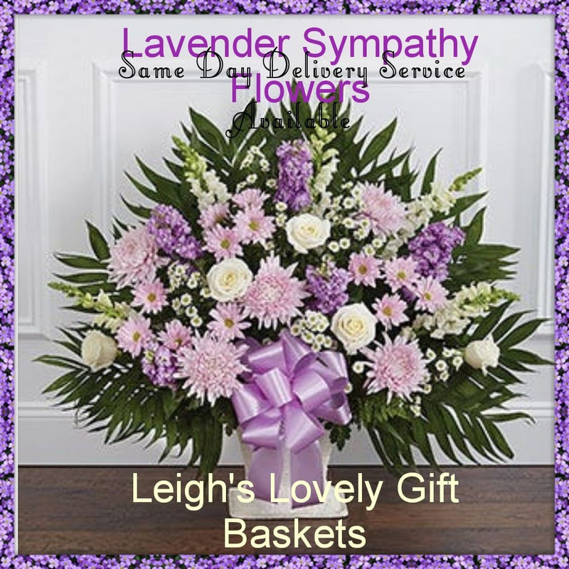 Beautiful Sympathy  Floor Basket Arrangement offers a balance of white and lavender flowers with White Roses,White Snapdragons, White Monte Casino, 
Lavender Stock, and Lavender Mums. Available with Same Day Delivery Service 
