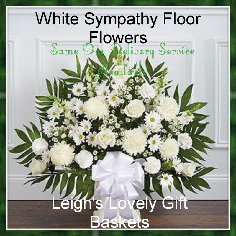 Large Floor Basket arrangement offers a symphony of white flowers including 
 Roses, Spider Mums, Snapdragons, Carnations, and
 Daisies and topped with a decorative white ribbon bow. Same Day Delivery Service is available. 