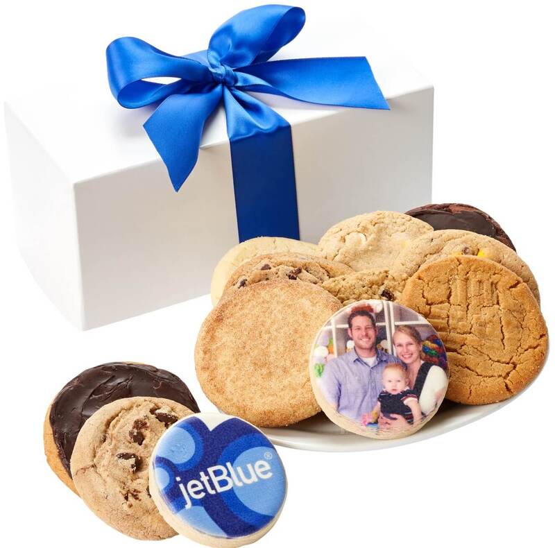 White gloss gift box holds an assortment of 10 gourmet flavored cookies and two custom printed cookies with your name, logo or photo. Tied with a beautiful ribbon bow for gift giving. 